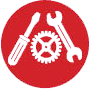 A red circular icon featuring a screwdriver, a wrench, and a gear, commonly representing tools or services.