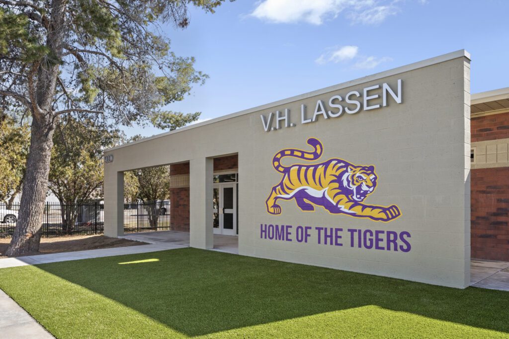 Entrance of V.H. Lassen Elementary School with a tiger mascot and the text "home of the tigers".